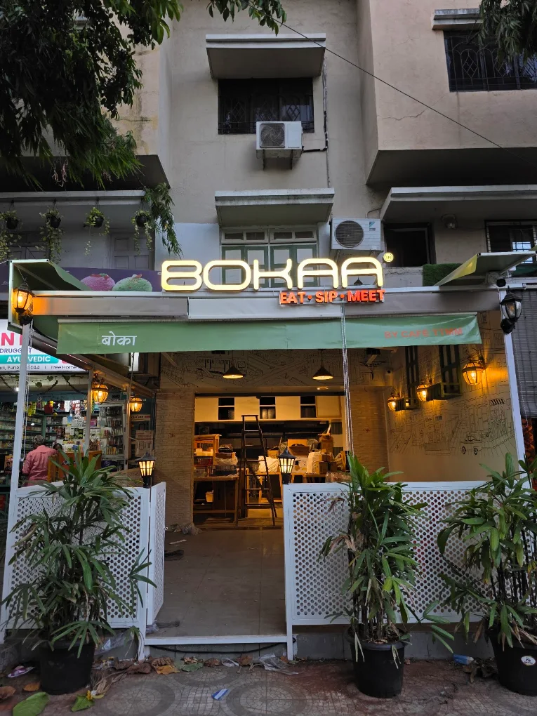 The Bokaa shopfront on Sector 27/A: a lit wordmark sign above a green awning